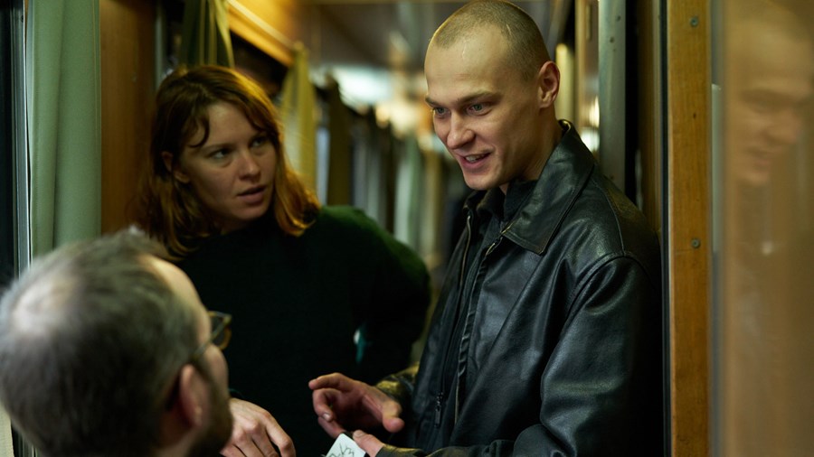 Seidi Haarla, Yuriy Borisov and Juho Kuosmanen on the set of Compartment No. 6